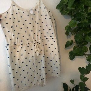 Cream and blue romper.